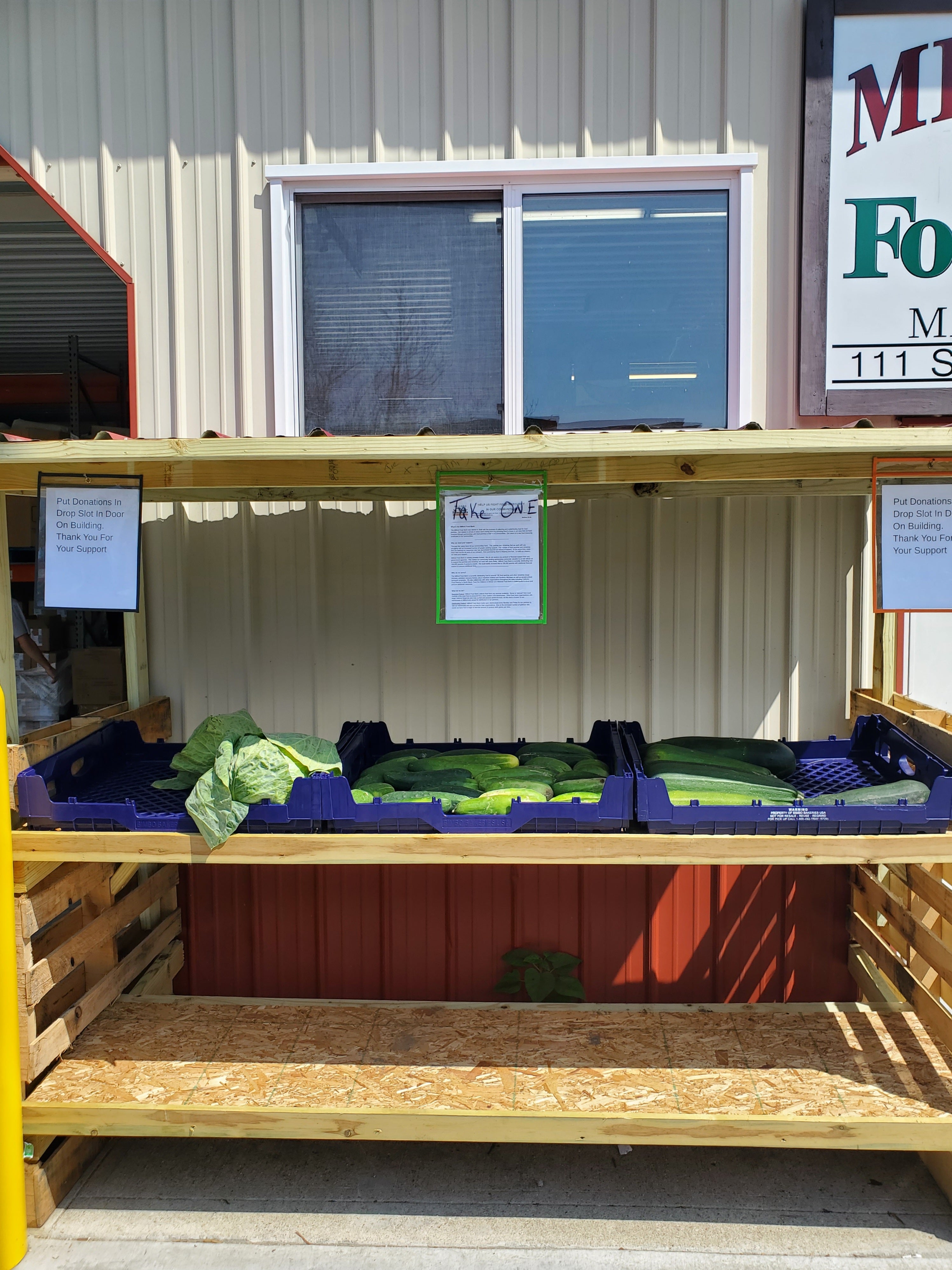 A free-for-the-taking produce stand sits in front of Milford Food Bank