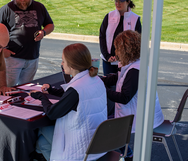 KREMC employees greet members at the 2022 EV Test Drive Experience.