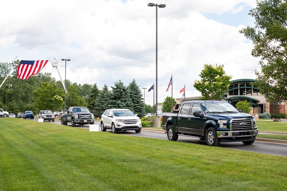 KREMC members drive through the property in a line at last year's annual meeting.