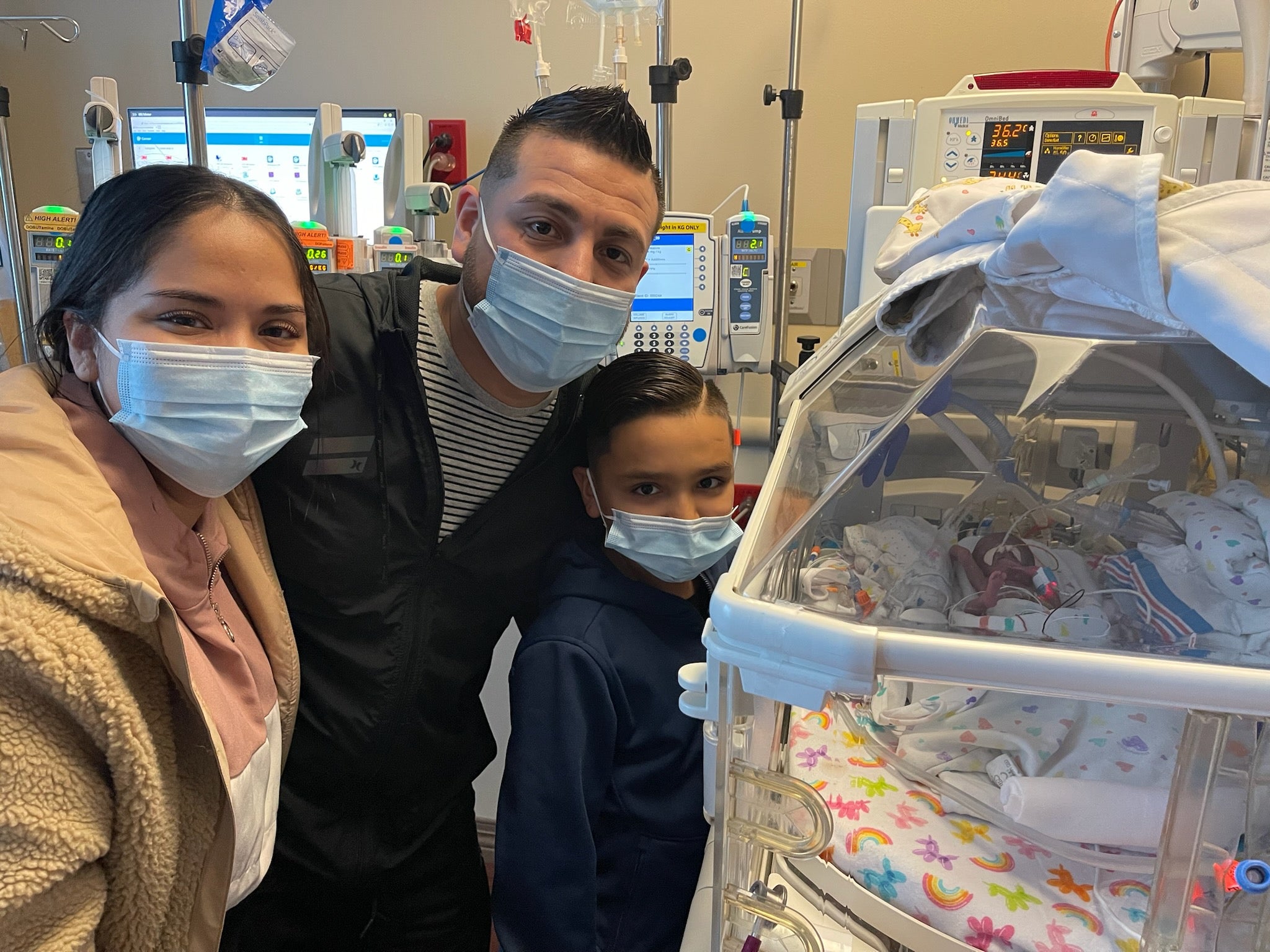 Family visiting baby in hospital
