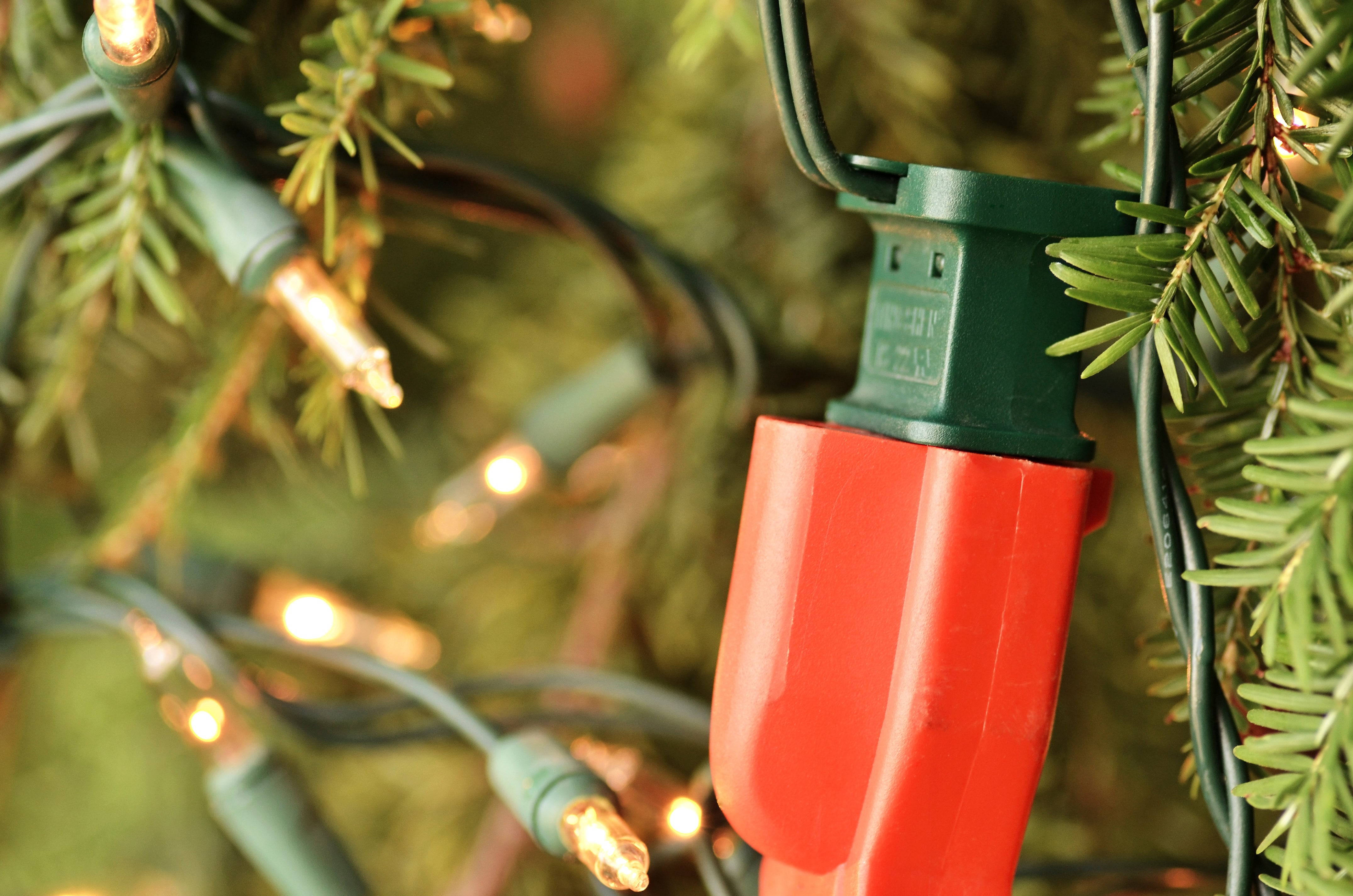 Extension cord connecting Christmas lights