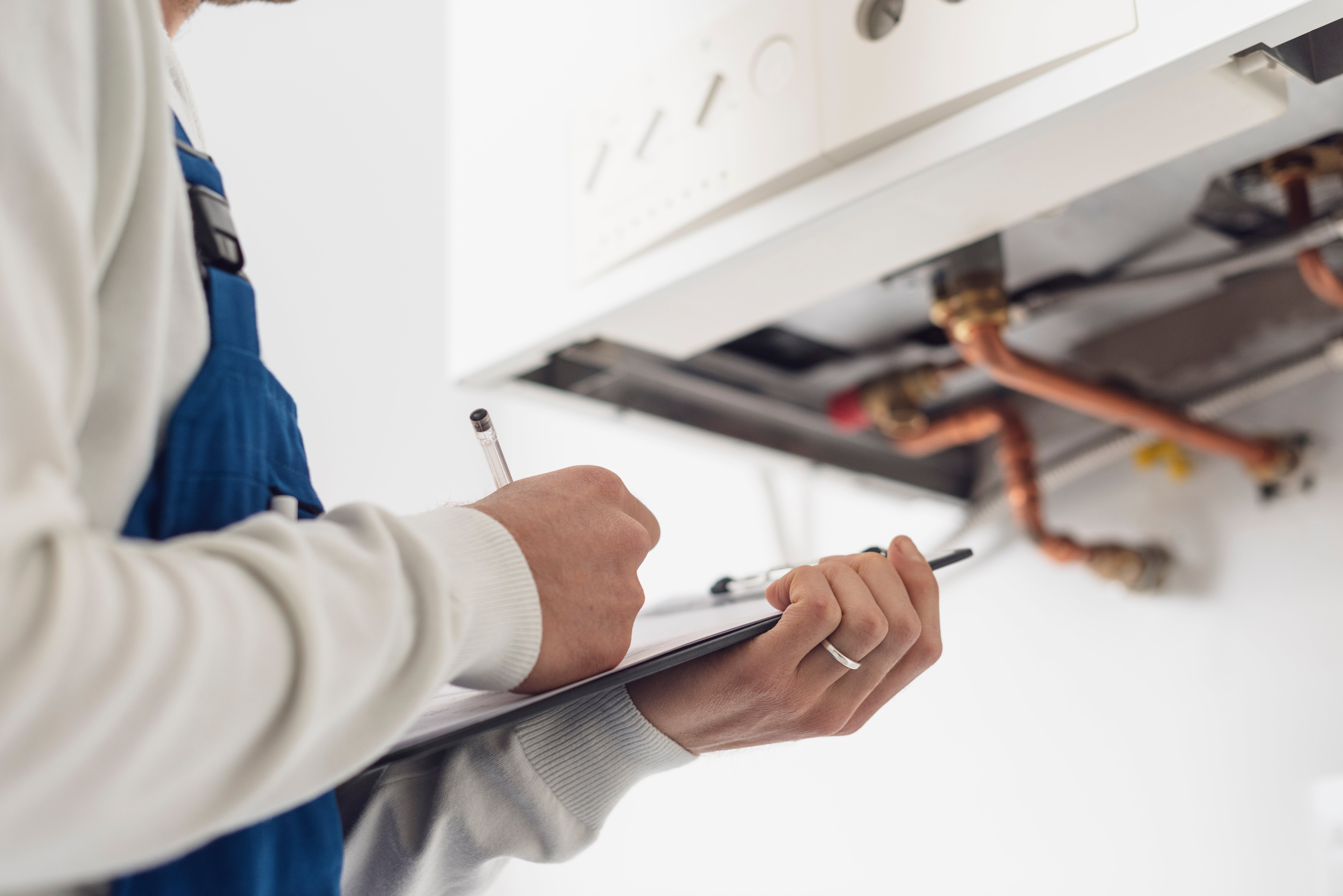 Woman holding electric home inspection checklist