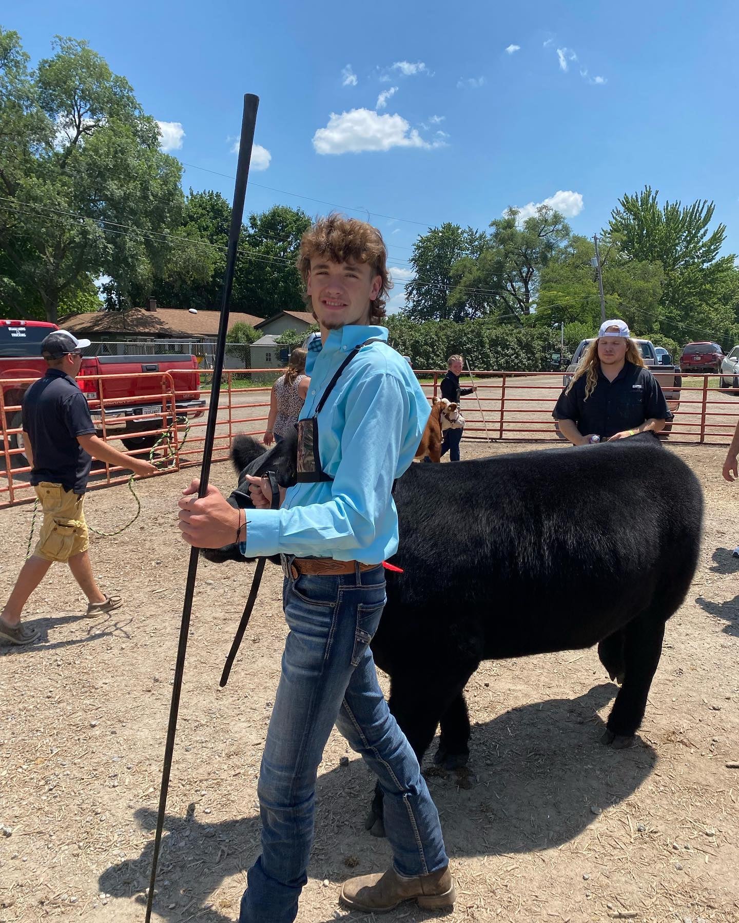 Riley Shepherd stands with his steer.