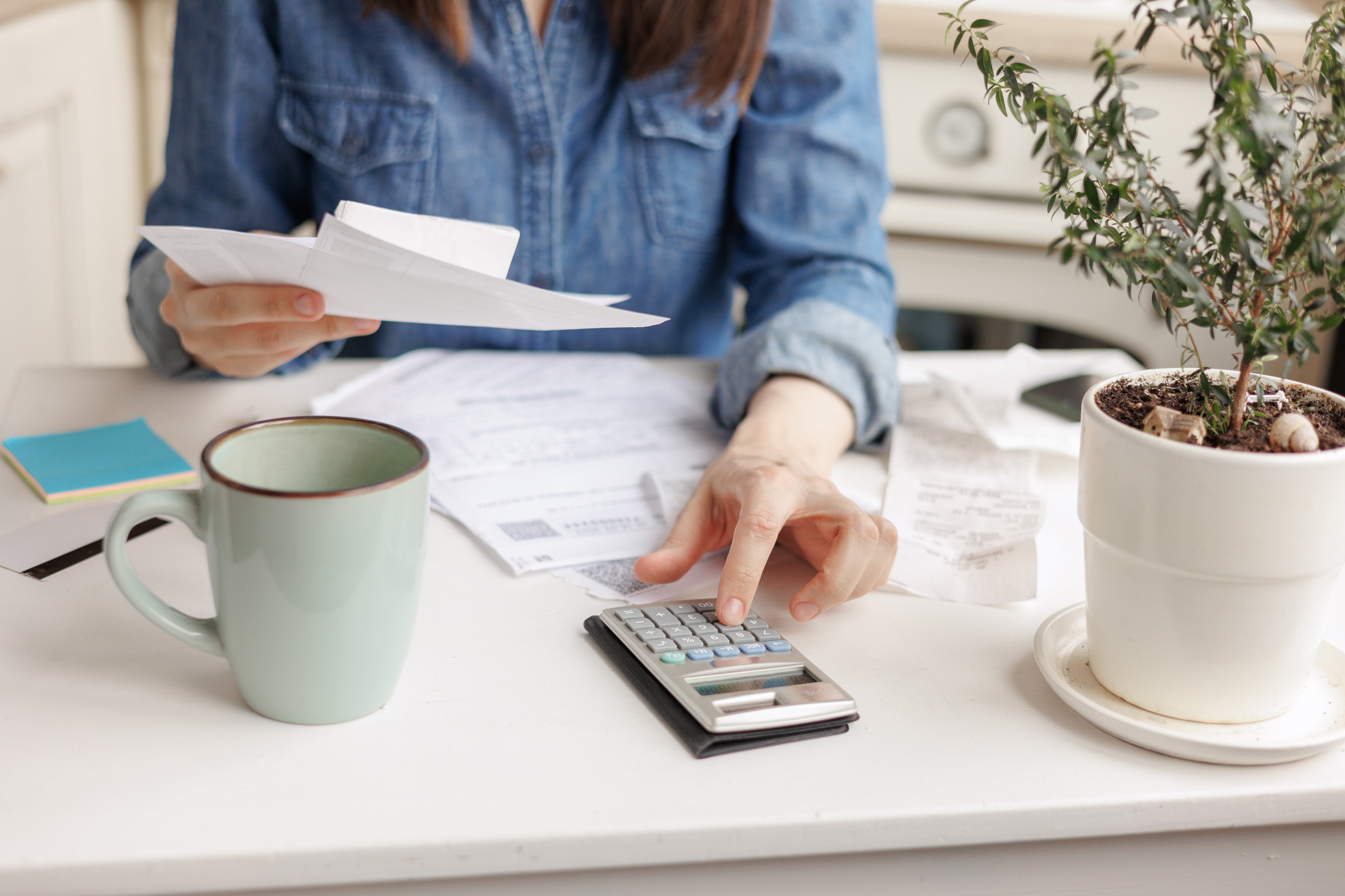 woman calculating utility bill